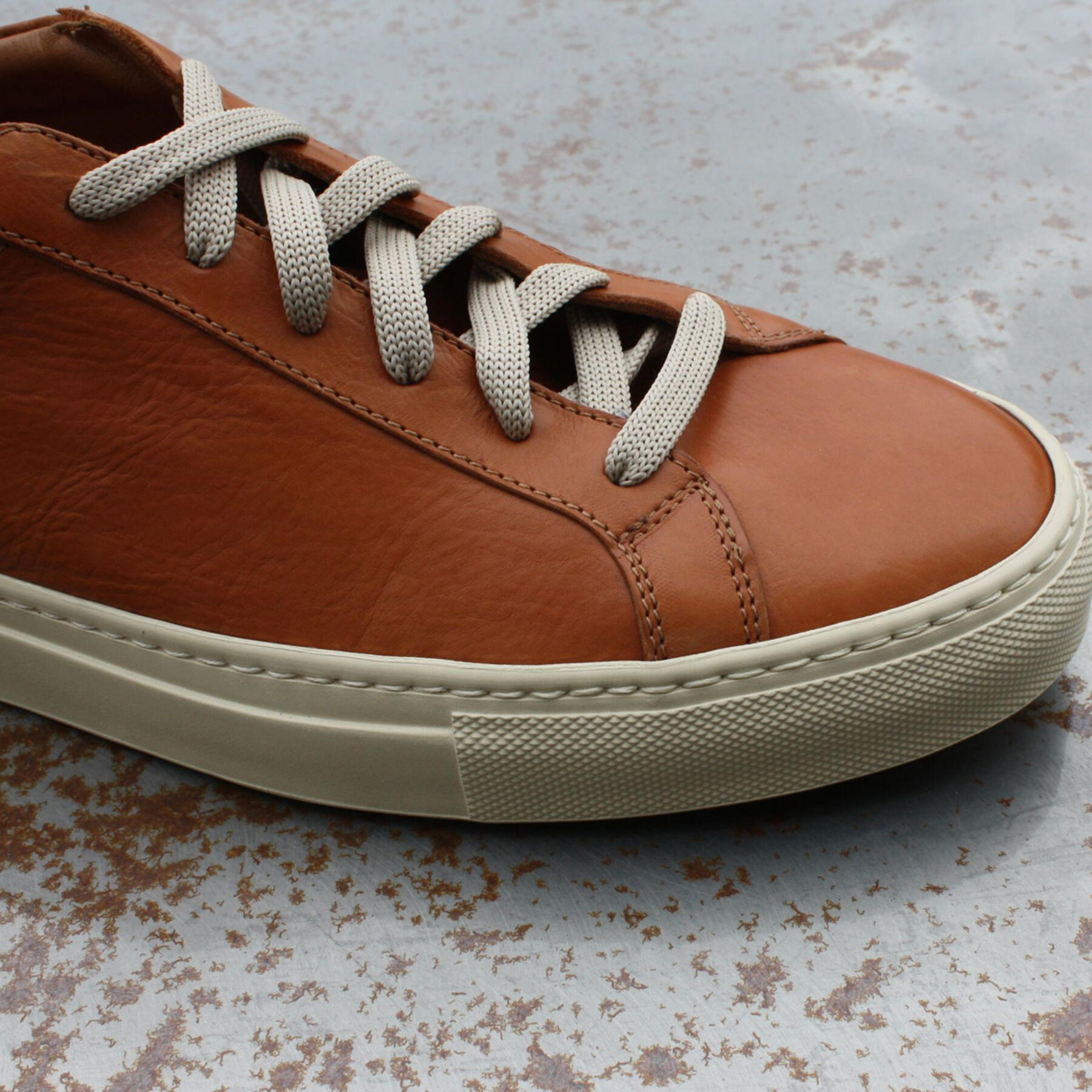 gustin sienna-green low top