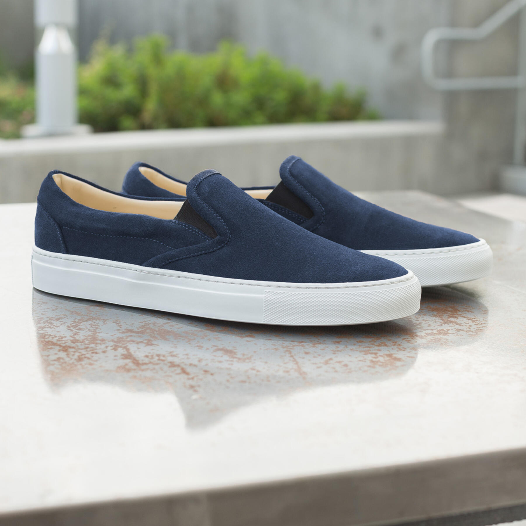 gustin navy slip on