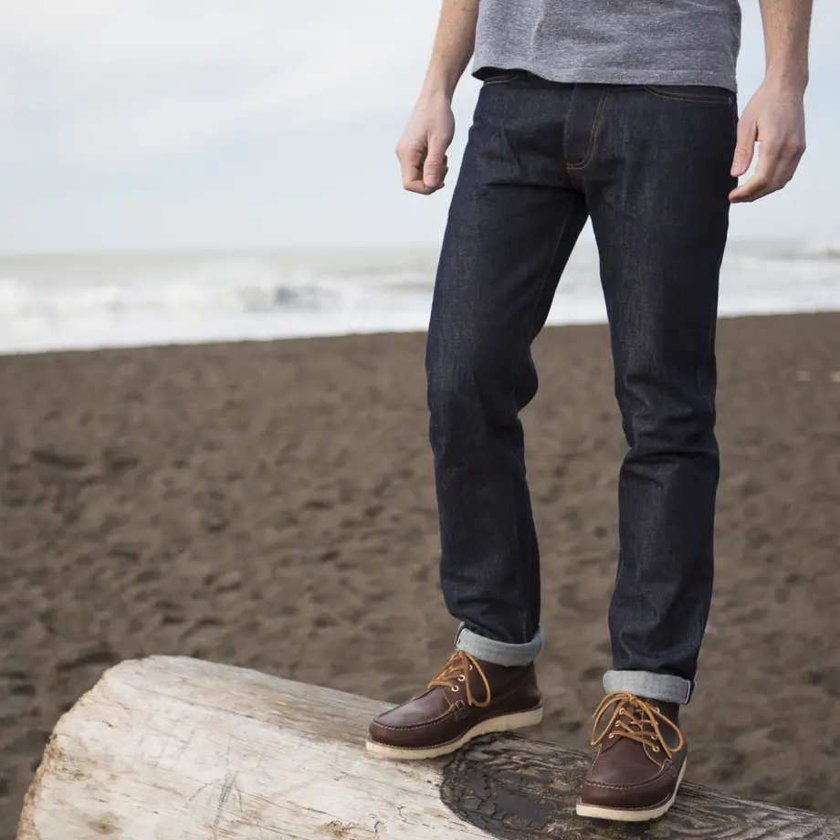 The 1968 selvedge jeans, cuffed, with boots