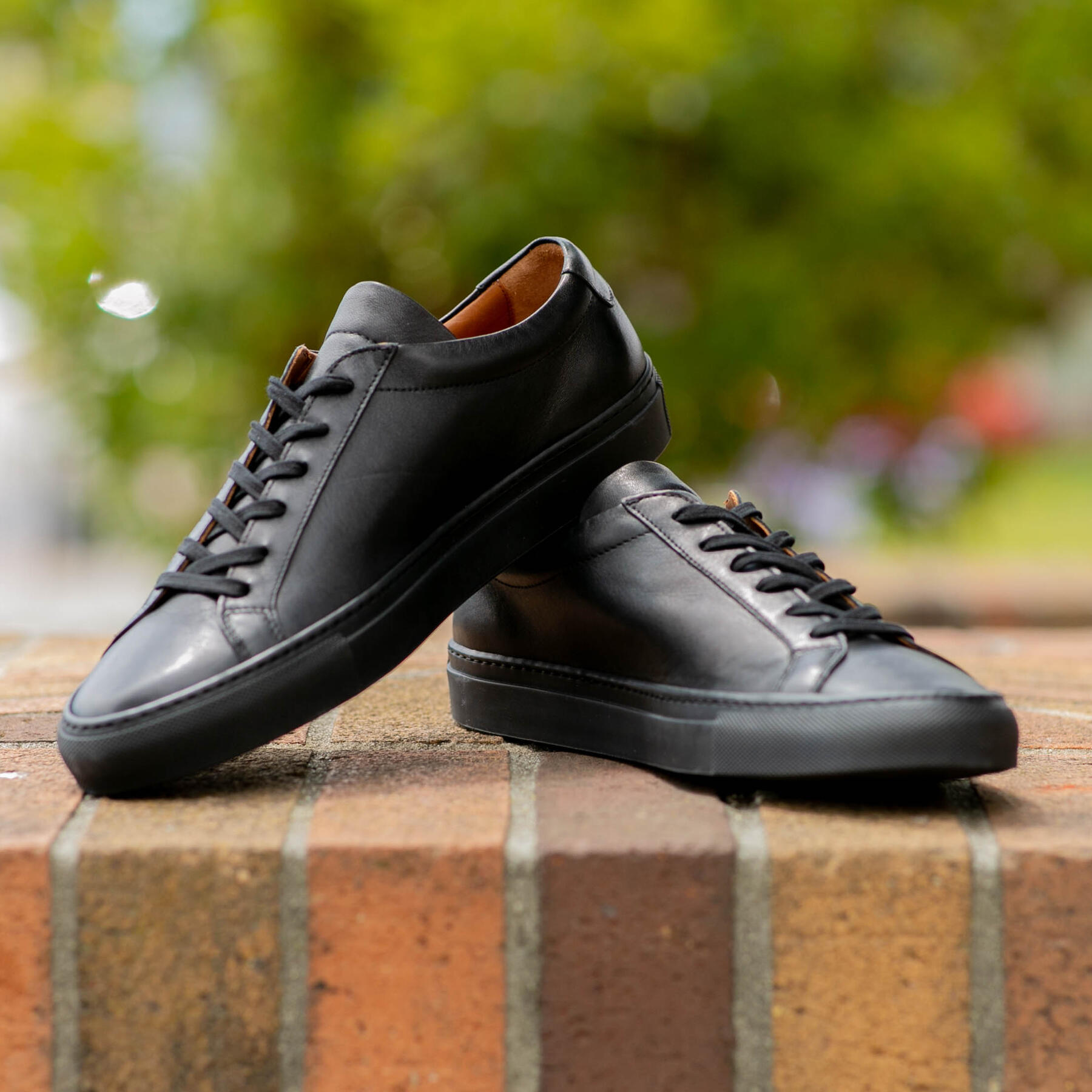 gustin black x black low top