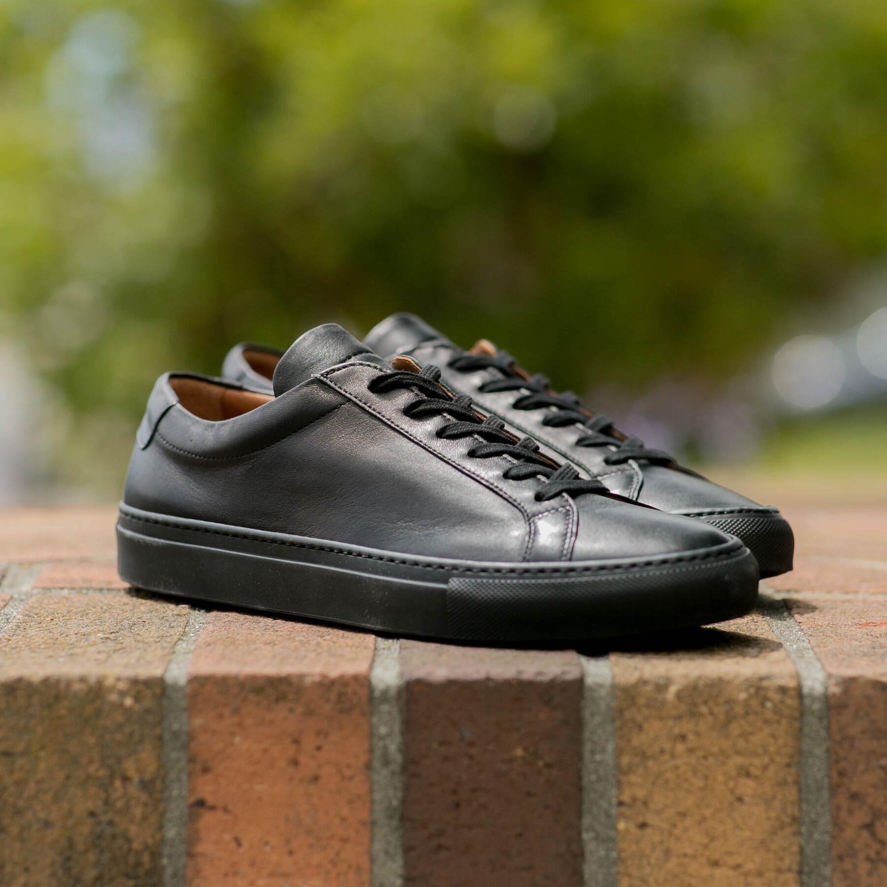 gustin black x black low top