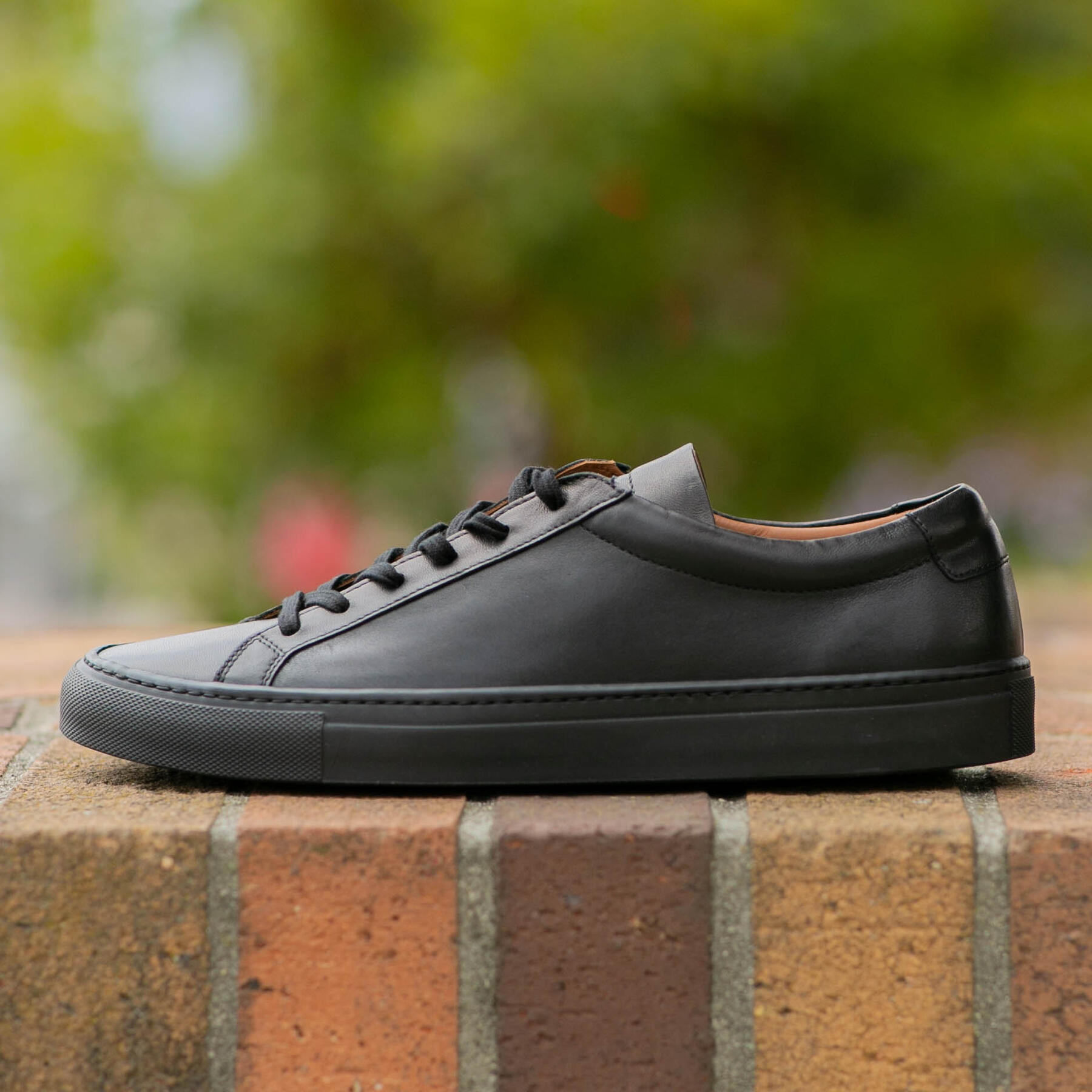 gustin black x black low top