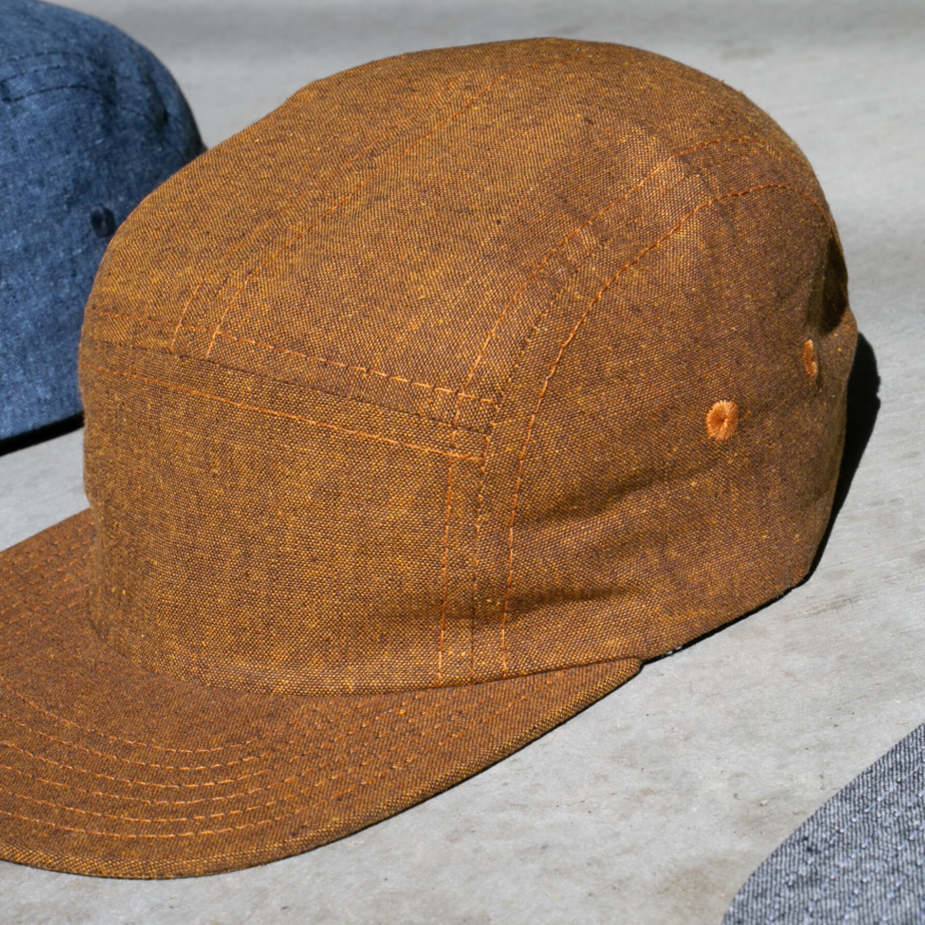 gustin camp hat - slub chambray rust