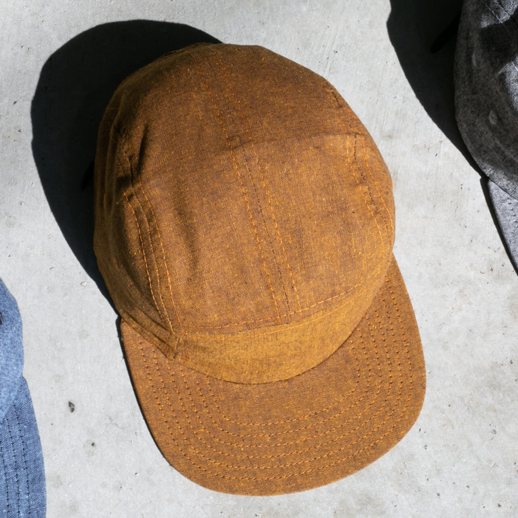 gustin camp hat - slub chambray rust