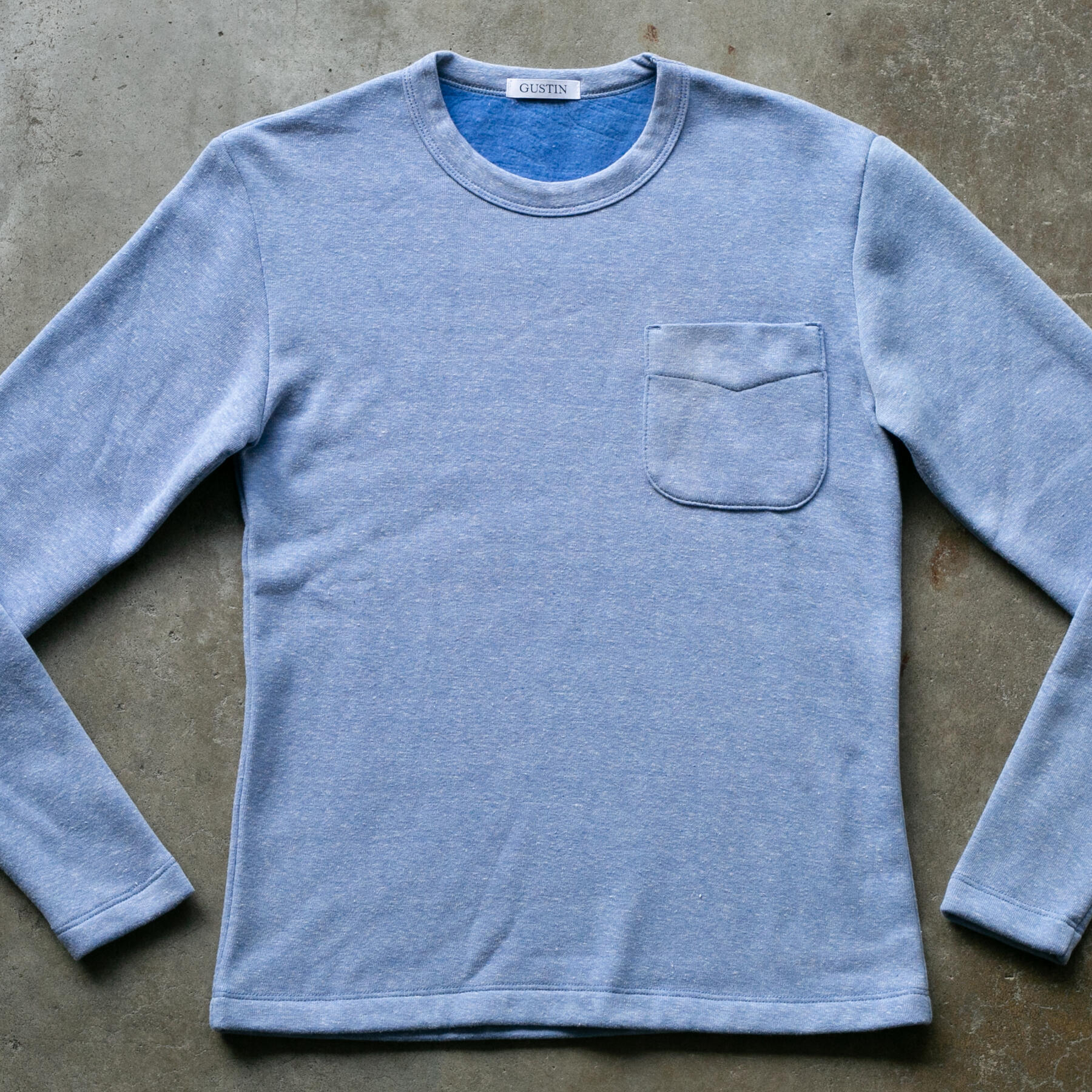 gustin fleece pocket crewneck - heather sky