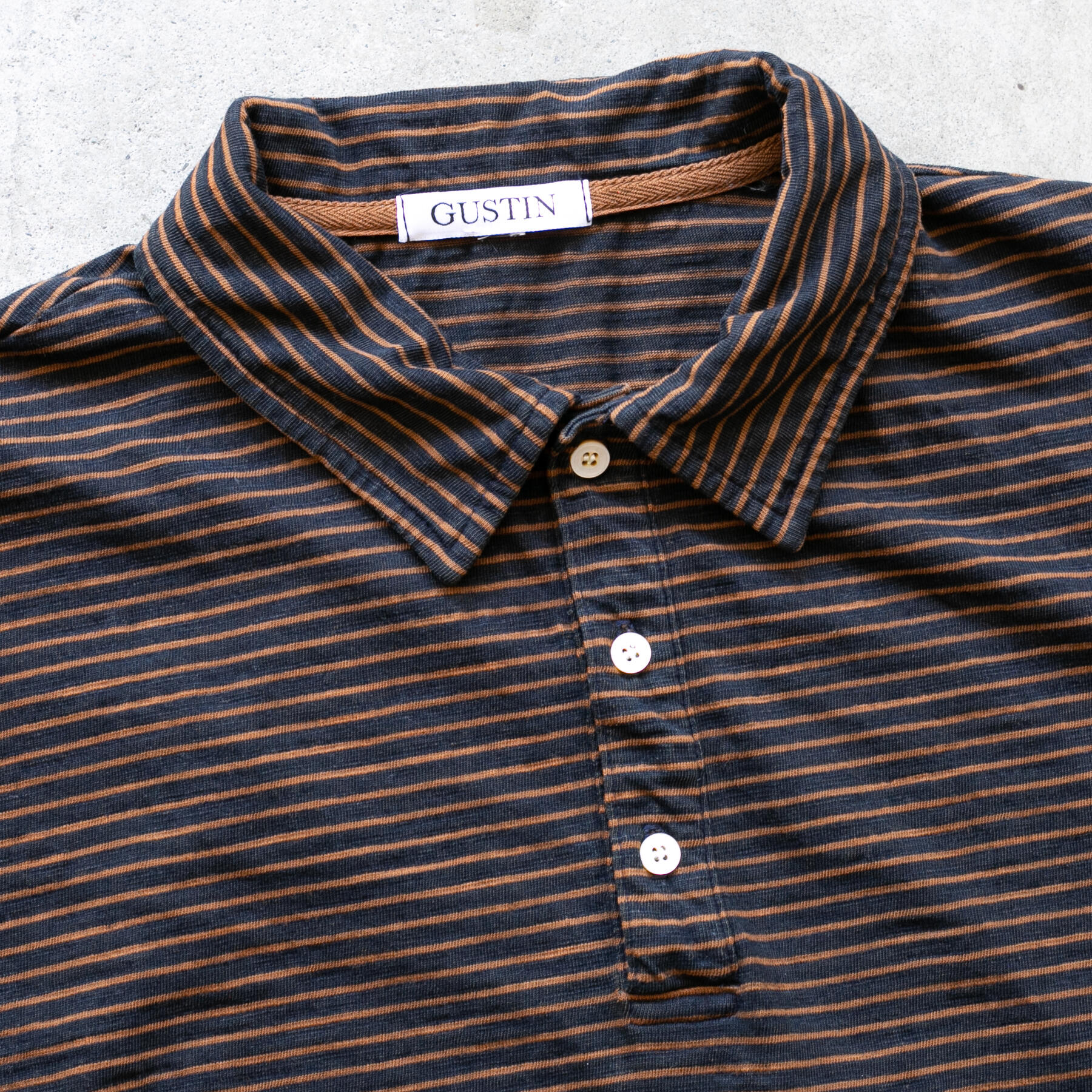 gustin overdye indigo stripe polo - burnt orange